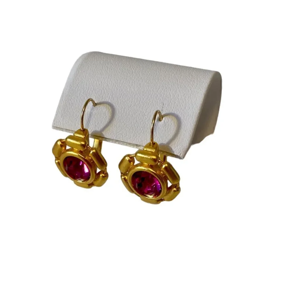 Beautiful pink stone & bright yellow gold toned huggie hoops.